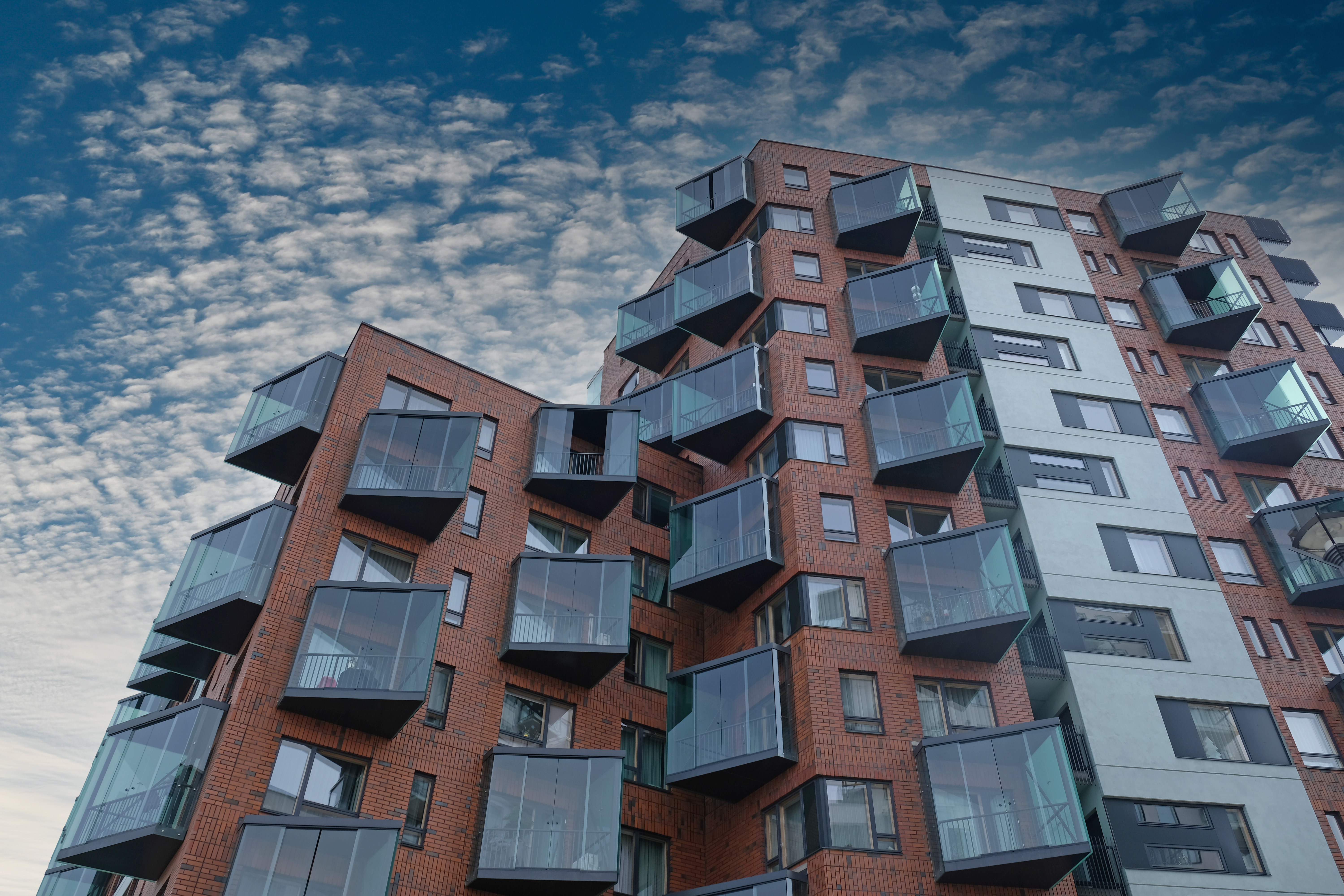 Modern residential development with glazed balconies